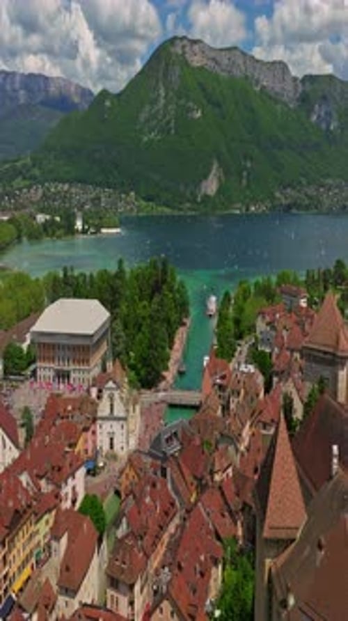 Old Town Center of Annecy and the River Thiou with Tourists Visiting An Emblematic River of Annecy