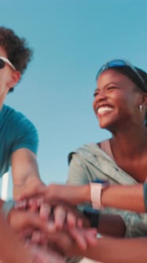 Happy people, friends or fitness with hands together in city for motivation, teamwork or mission