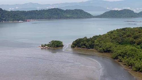 Aerial drone view of Batu Kawan mangrove shoreline and bay