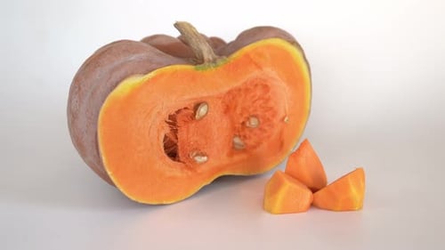 Still Life of a Cut Pumpkin and Seeds
