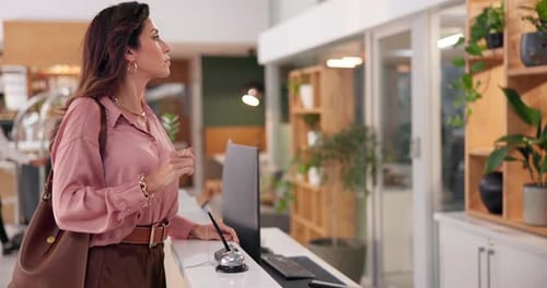 Angry, woman and reception with bell at hotel for assistance, waiting and delay to check in