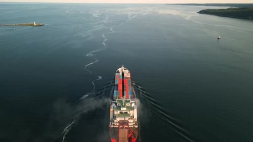 Aerial View of a Small Cargo Container Ship Leaving the Harbor Canada