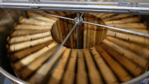 Honey Extractor Machine Spinning Honeycombs at High Speed