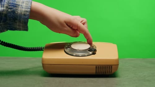 Retro Vintage Phone on Chroma Key Green Screen Rotary Telephone is Displayed on a Wooden Desk Adding
