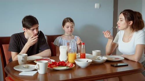 Family Enjoying Meal Together at Home
