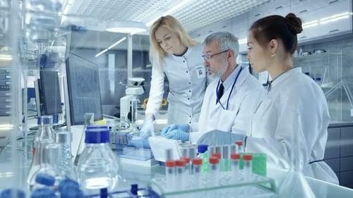 Medical Researchers Working in Modern Laboratory Setting