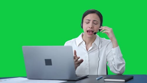 Angry Indian call center girl shouting on the customer Green screen