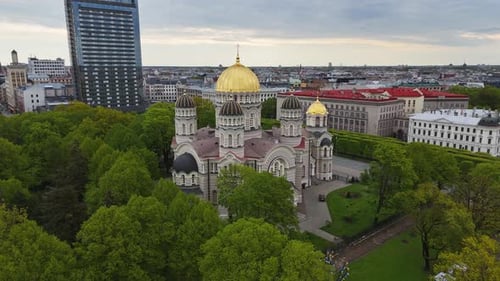 Aerial view of Nativity Cathedral in Riga with spring greenery and cityscape
