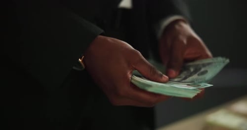 Hands, fraud and counting cash for money laundering, capital and investment scam in crime syndicate