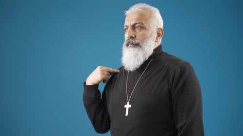 Adult Performing Sign of the Cross