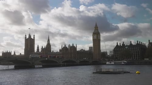 Iconic London Sky: Big Ben and Parliament with Sun and Clouds