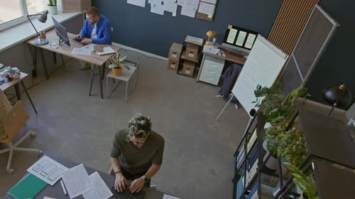 UX Designers Working on Mobile App then Discussing Plan at Whiteboard in Office