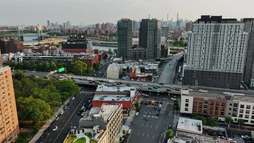 An aerial view of a city with lots of tall buildings