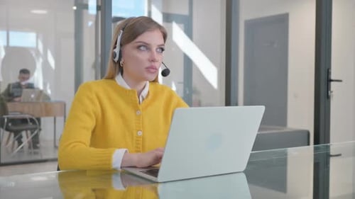 Call Center Woman with Headset Talking Online with Customer