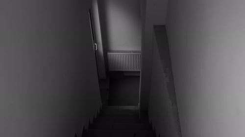 Tactical Figure Descends Staircase