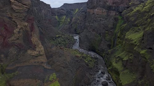 Moody aerial perspective of a rugged canyon landscape