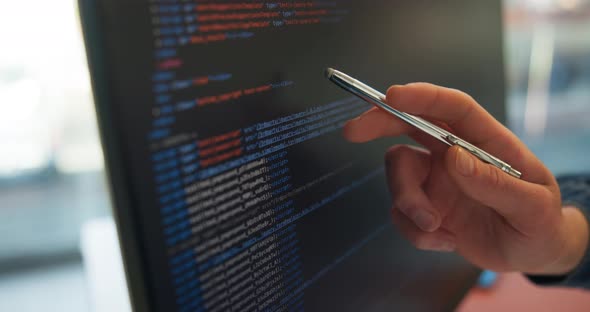Person, hand and code with HTML on computer screen for software ...