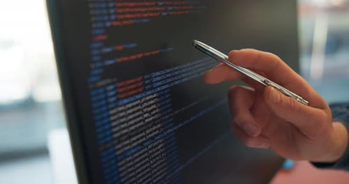 Person, hand and code with HTML on computer screen for software development