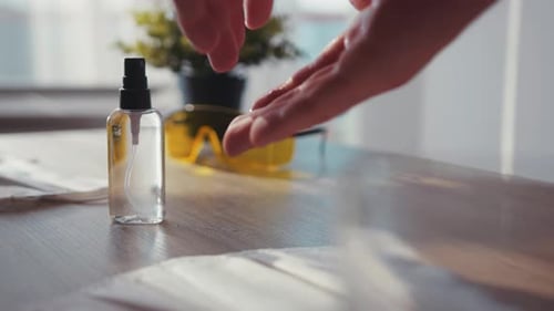 Close Up Man Hands Using Sanitizer COVID19 Pandemic Coronavirus Dispenser Protection Liquid Bottle