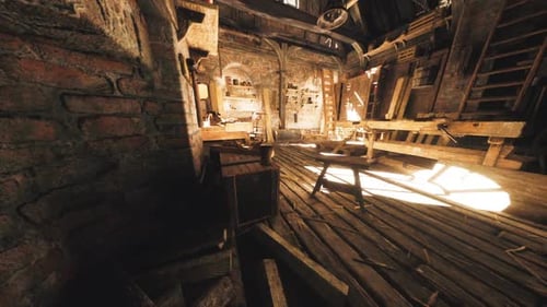 Rustic Interior of an Old Workshop Filled with Tools and Wooden Furniture