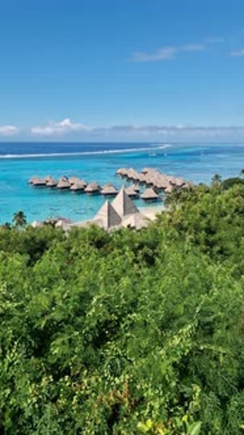 Vertical View of Luxury Tropical Retreat on Moorea Island, French Polynesia. Overwater Bungalows