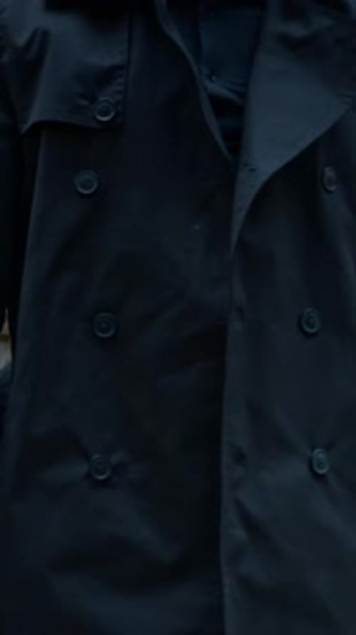 Bereaved Man Leaning on Tombstone in Profound Sorrow during Visit to Cemetery