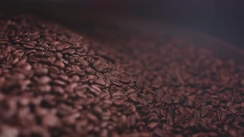 Rotating Roasted Coffee Beans Close Up