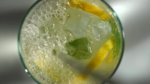 Refreshing Lemonade with Mint and Ice in Glass