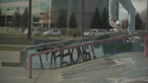 Extreme sports - Slow motion board slide - skateboard in skatepark