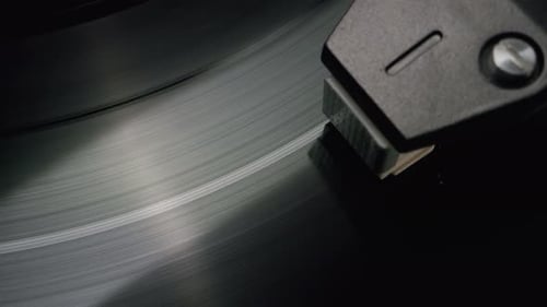 Vinyl Record Spinning on Turntable Close Up