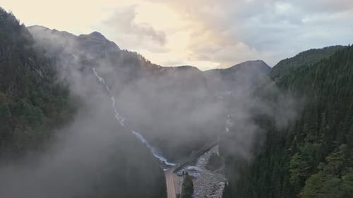 Famous Latefossen waterfall flowing through rocky terrain in Norway