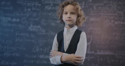 Confident Student Standing Before Math-Filled Chalkboard