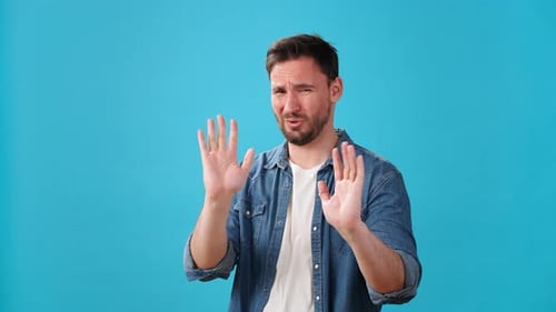 Man Considering and Declining an Offer on Blue