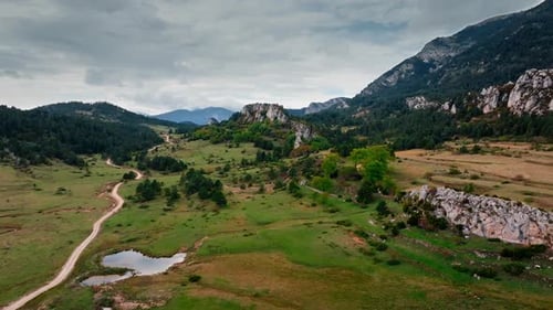 Aerial View of Beautiful Valley in Mountain Scenery in the Late Afternoon