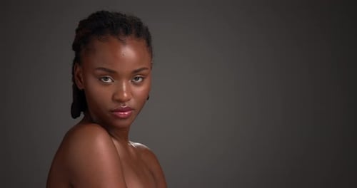 Beauty, skincare and face of black woman in studio for mockup, self care and clear skin glow