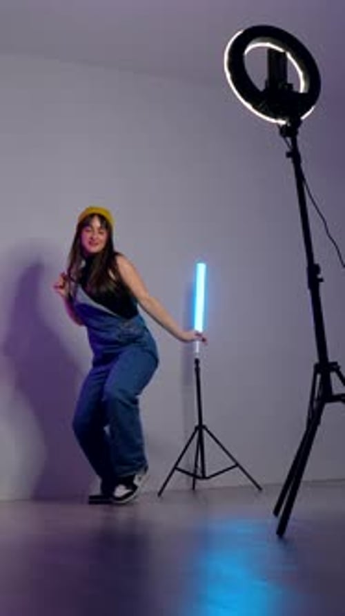 Young dancer practicing energetic routine in dance studio