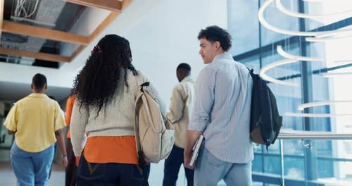 Walking, students and friends in hallway, college and education for academic development