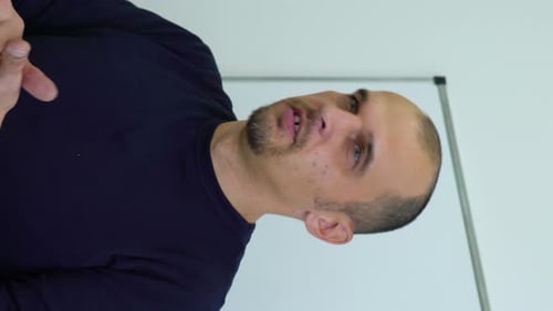 Man Speaking to Camera in Indoor Environment
