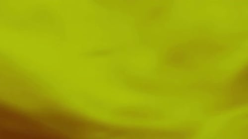 Seamlessly Looping Yellow Gold Fabric Waving Background