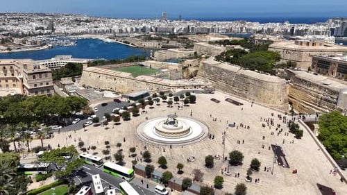 Drone shot of Triton Fountain in Valletta city, capital of Malta