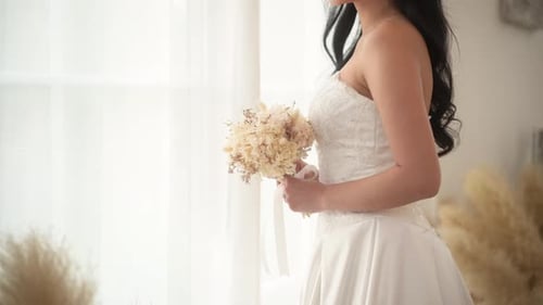 Radiant Bride Smiling with Bouquet in White Dress