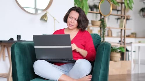 Sad Woman Working Laptop Computer Unhappy Person Use Computer Technology at Home Worried Girl Stress