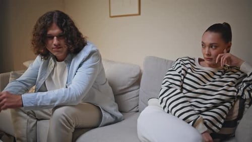 Worried Couple Discussing Relationship Problem in Living Room Sofa Closeup