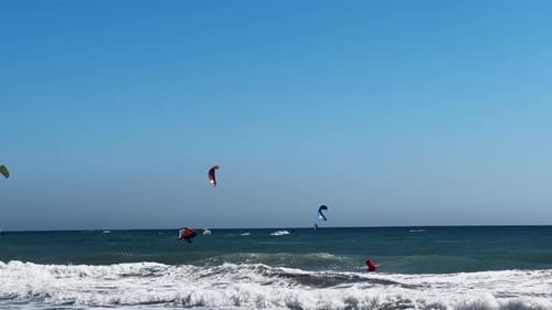 Kite Surfing Silhouettes of a Kite Boarders Making Trick Watersport Activity