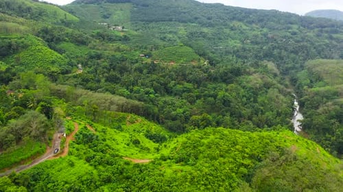 Mountains with Green Forests and Agricultural Land with Farm Plantations
