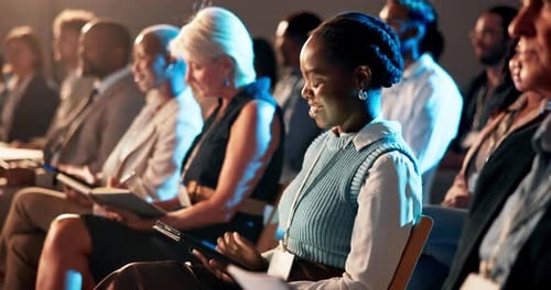 Audience, conference and tablet with business woman in auditorium for development seminar