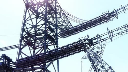 aerial view electric substation, pylon power line high voltage, electrical transmission field,