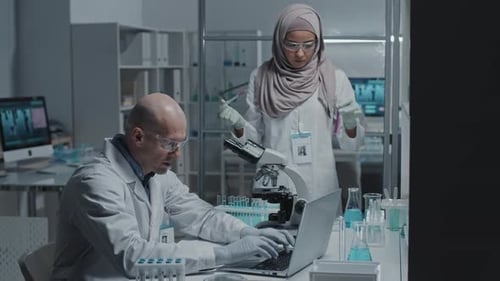Colleagues Working in Science Lab