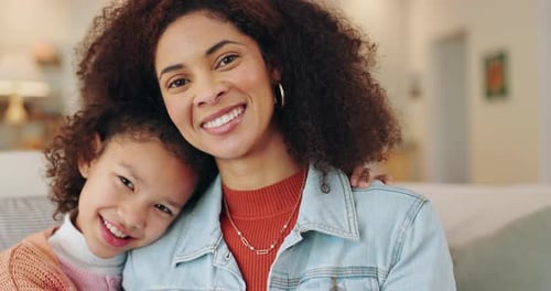 Affectionate Woman and Child Smiling