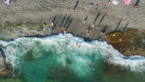 Aerial Video of Tourists Sunbathing on Mediterranean Beach